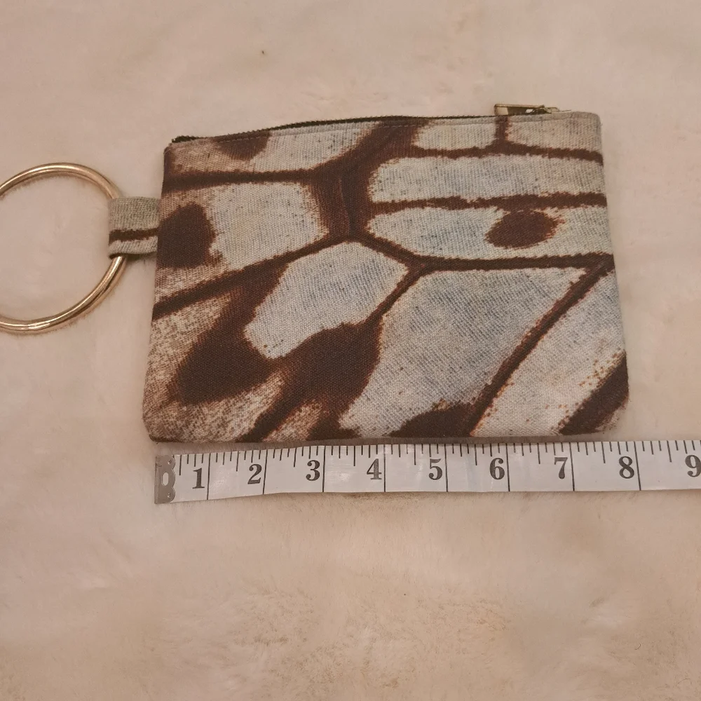 Ink & Alloy O-Ring Clutch Bag